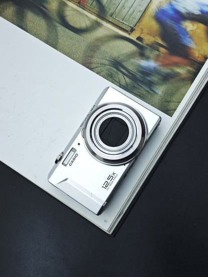 Used Casio EXILIM EX-ZS100 Digital Camera