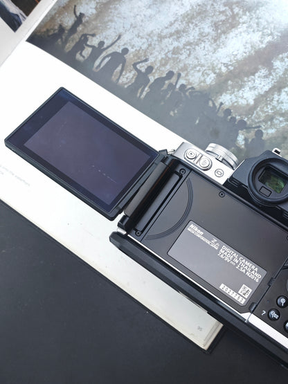 Used Nikon Zfc silver with 28mm F2.8 SE Digital Camera [No charger]