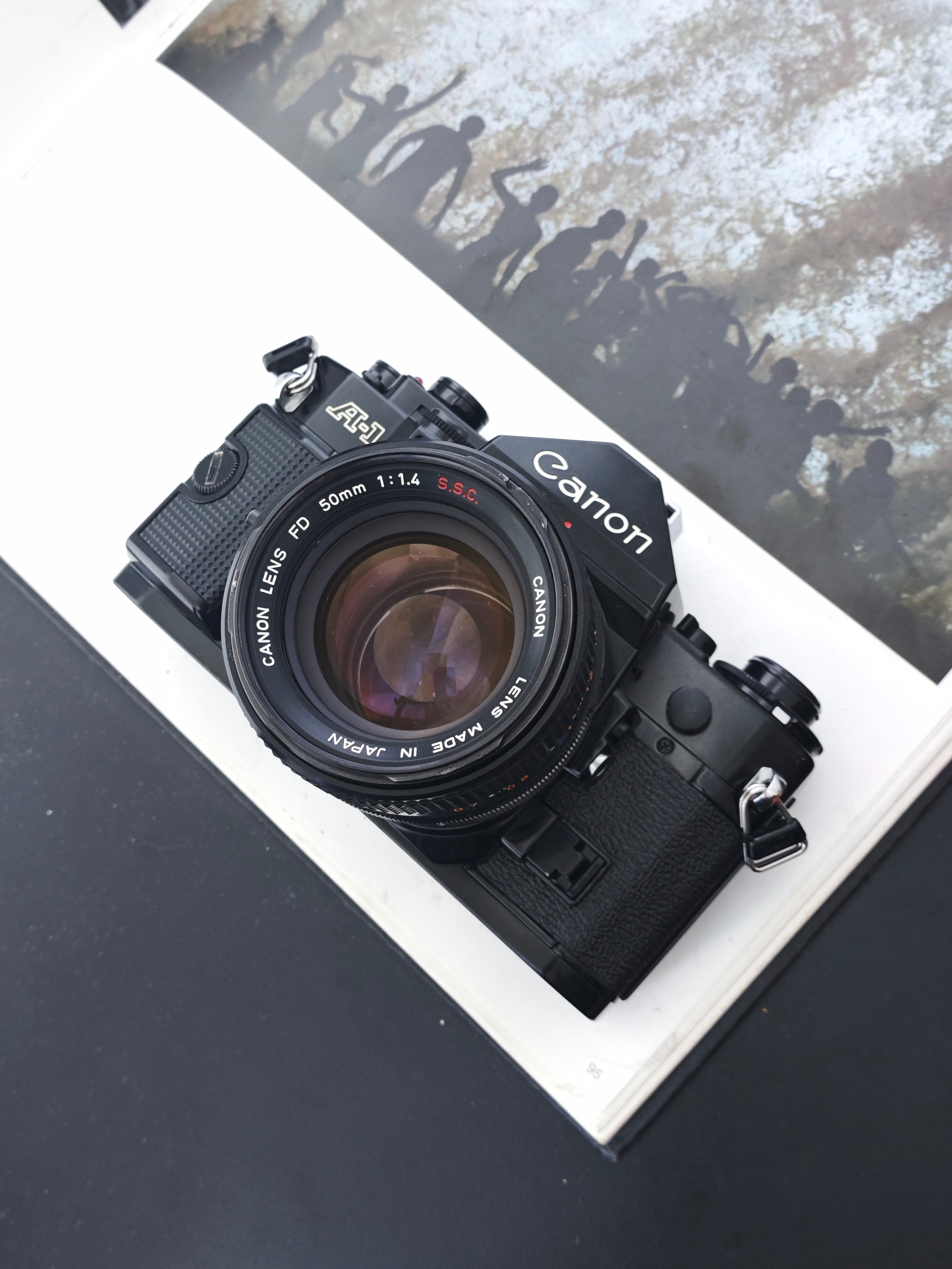 ストラップ付き Canon A-1 + 50mm f1.4 SSC S.S.C. Canon A-1 black with FD 50mm F1.4 S.S.C. – UNIT CAMERA SHOP | BKK