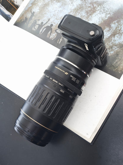 Used Canon EOS M with Zoom Lens EF 100-300mm F4.5-5.6 [+Adapter EF-EF-M/Speedlite 90EX, No charger]