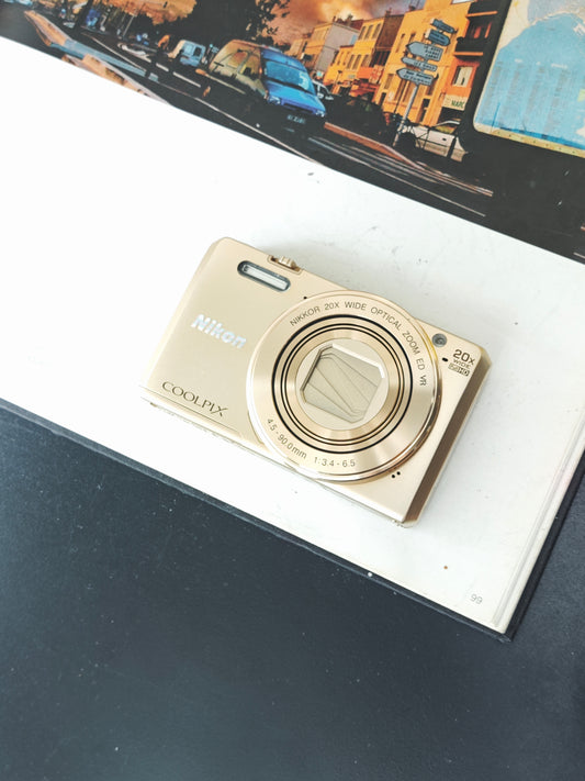 Used Nikon Coolpix S7000 gold Digital Camera [No charger]