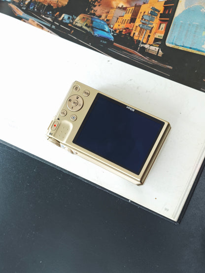 Used Nikon Coolpix S7000 gold Digital Camera [No charger]