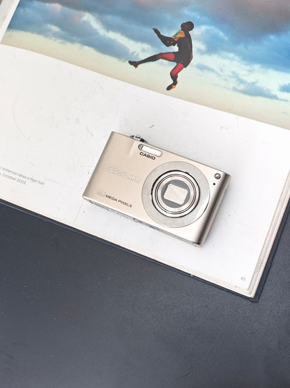 Used Casio EXILIM EX-Z100 gold Digital Camera [No charger]