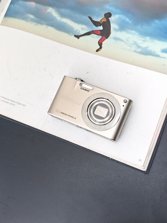 Used Casio EXILIM EX-Z100 gold Digital Camera [No charger]