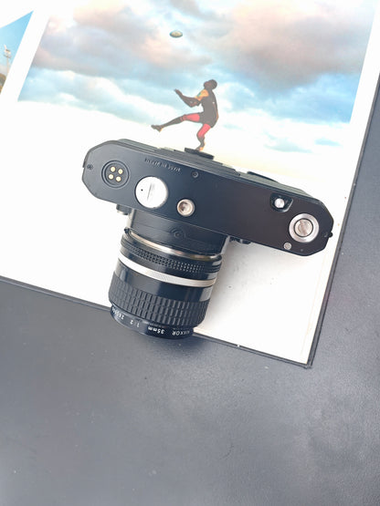 Nikon FE2 black with Nikon Nikkor 35mm F2 Ai-S