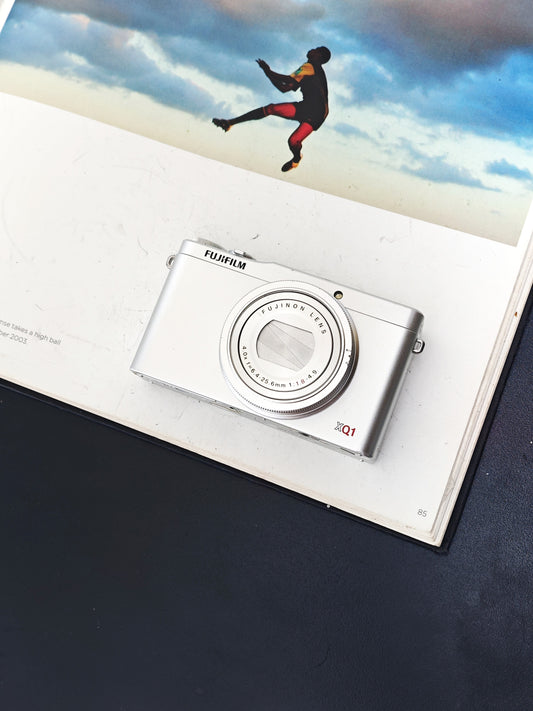 Used Fujifilm XQ1 silver Digital Camera [No charger]