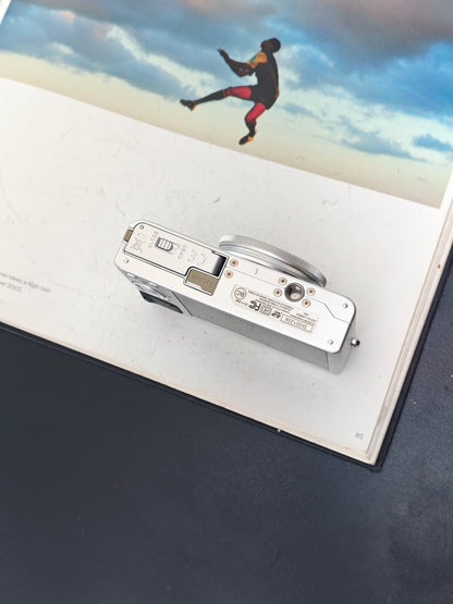 Used Fujifilm XQ1 silver Digital Camera [No charger]