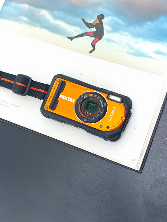 Used Pentax Optio W90 orange Digital Camera [No charger]