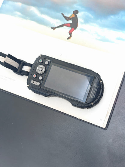 Used Ricoh WG-4 silver Digital Camera [No charger]