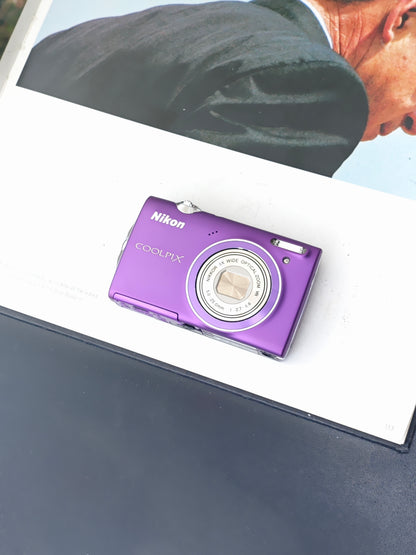 Used Nikon Coolpix S5100 purple Digital Camera [No charger]