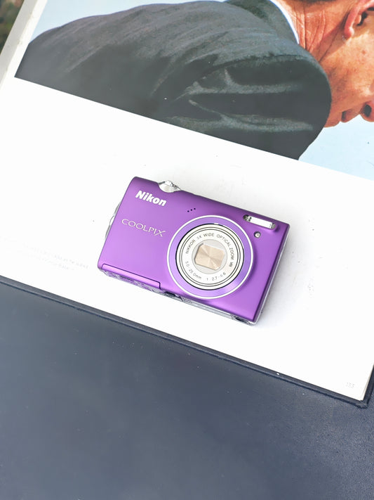 Used Nikon Coolpix S5100 purple Digital Camera [No charger]