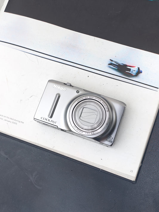 *READ* Used Nikon Coolpix S9500 silver Digital Camera [No charger]