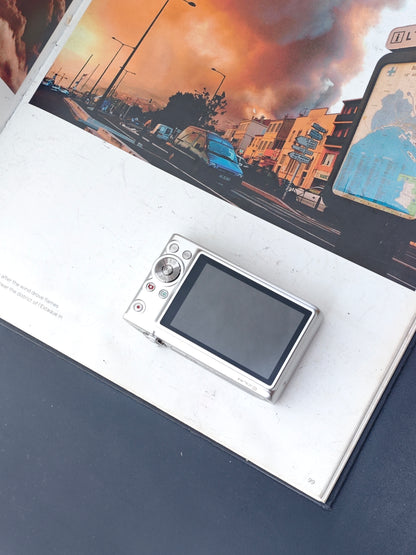 Used Casio EXILIM EX-Z100 silver Digital Camera [no charger] #10011879A
