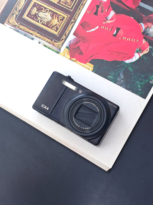 Used Ricoh CX4 black Digital Camera [No charger]