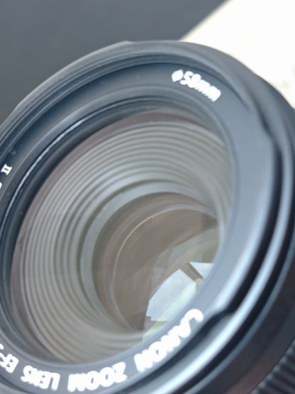 Used Canon EOS Kiss X7 with Canon Lens Zoom EF-S 55-250mm F4-5.6 [No charger]