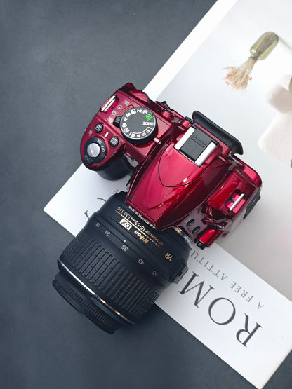 Used Nikon D3100 red with Double Zoom Kit