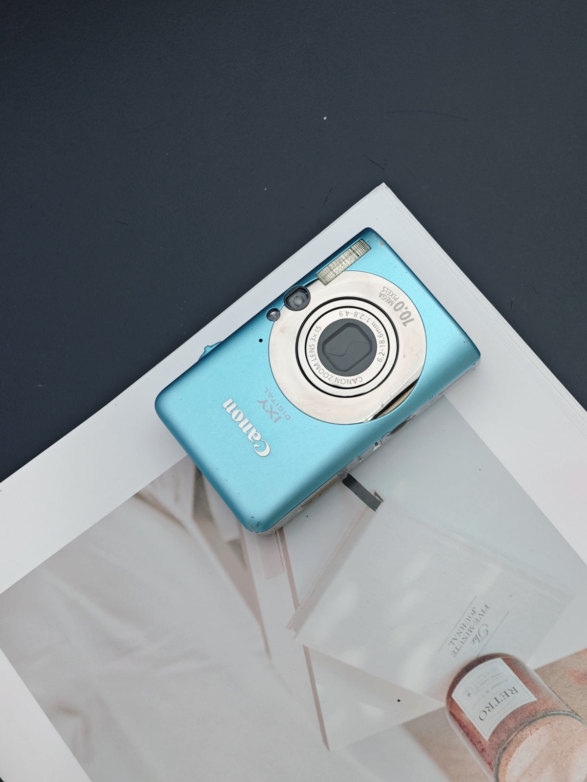 Used Canon IXY Digital 110 IS light blue Digital Camera