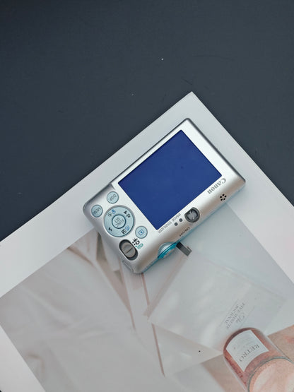 Used Canon IXY Digital 110 IS light blue Digital Camera