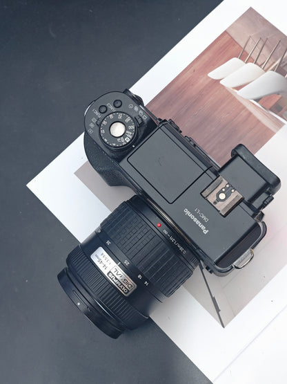 Used Panasonic Lumix DMC-L1 with Leica D Vario-Elmarit 14-50mm F2.8-3.5 ASPH. MEGA O.I.S. Camera [No charger]