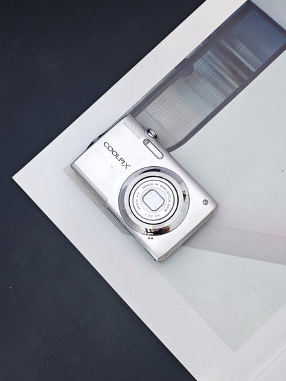 Used Nikon Coolpix S3000 silver Digital Camera [No charger]