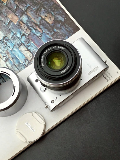 Used Nikon 1 J1 silver with 30-110mm F3.8-5.6 [No charger]