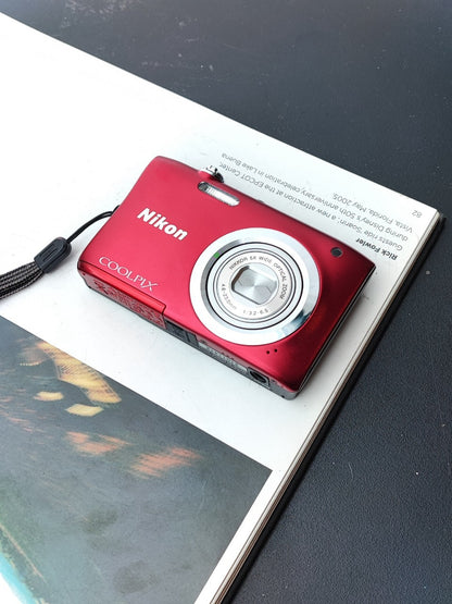 Used Nikon Coolpix A100 red Digital Camera (No charger)